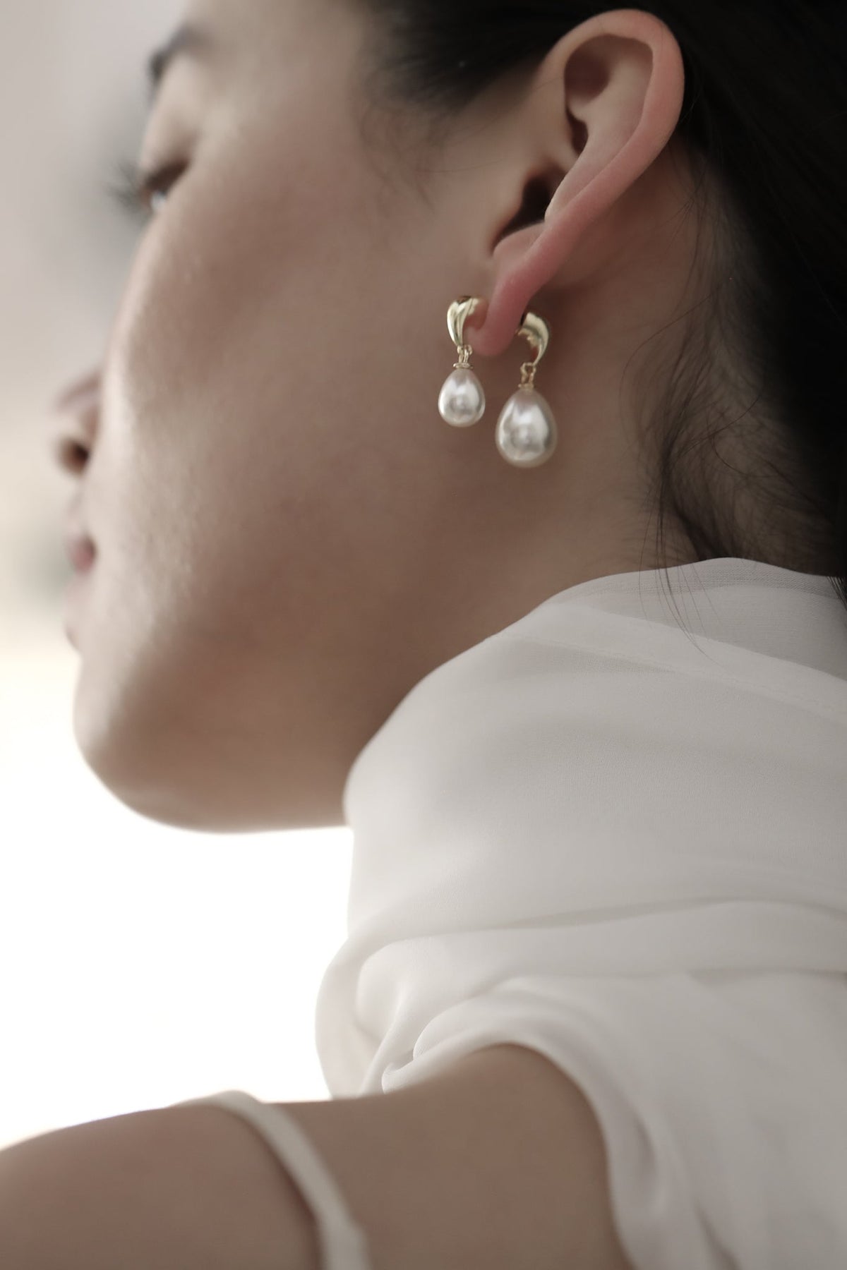 Gilded Asymmetric Pearl Drop Earrings